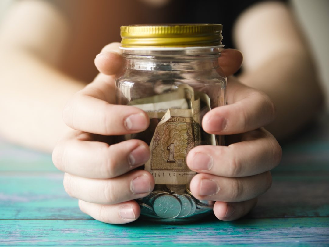 https://hopenation.lk/wp-content/uploads/2024/07/hands-holding-savings-jar-1080x810.jpg